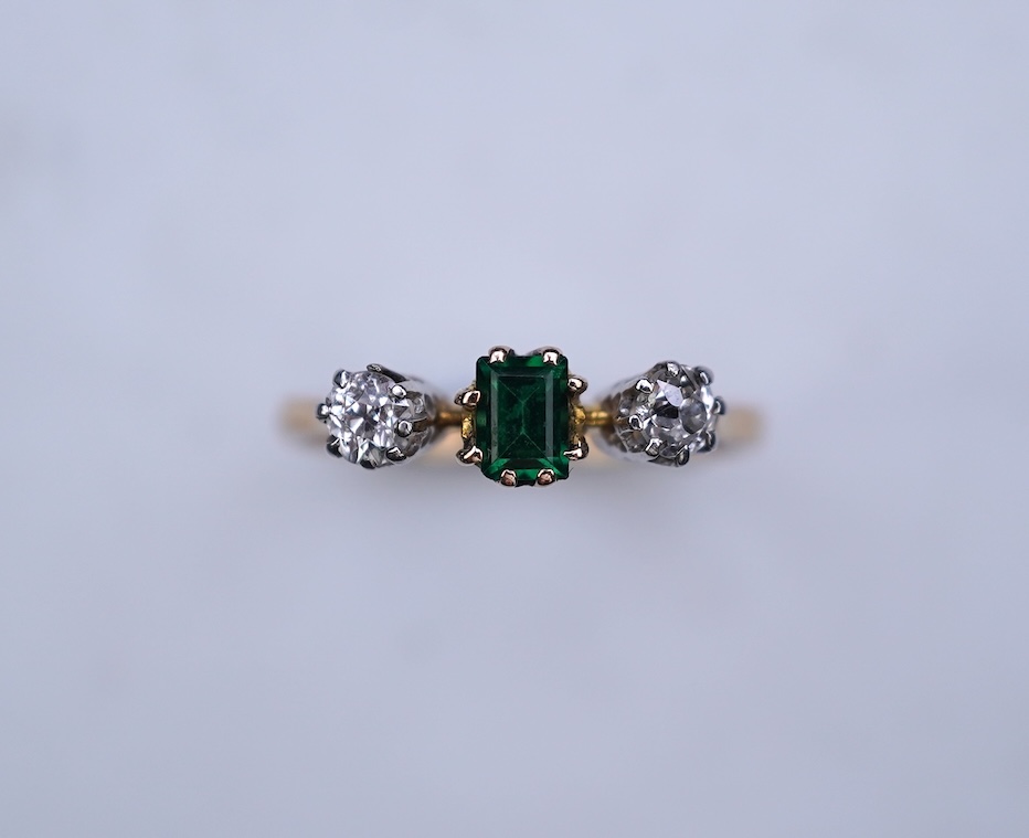 A tsavorite and diamond ring